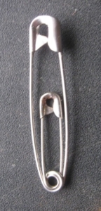 Large paperclip with small paperclip inside it